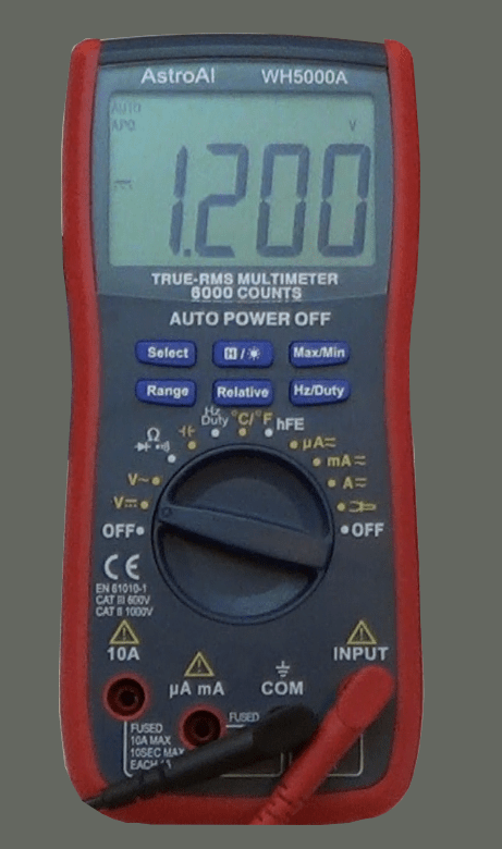 Picture of a digital multimeter measuring volts.